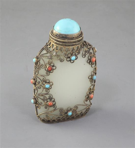 A Chinese pale celadon jade, silver and turquoise and coral mounted snuff bottle, late 19th century, 7.5cm (no. 755)
